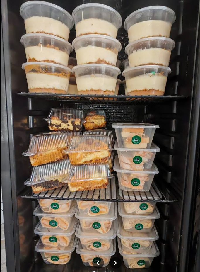 Fridge full of cheesecakes and treats
